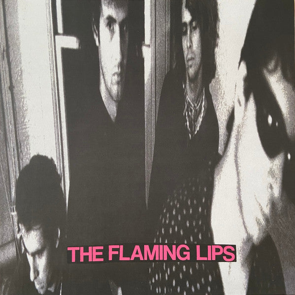 Album art for The Flaming Lips - In A Priest Driven Ambulance