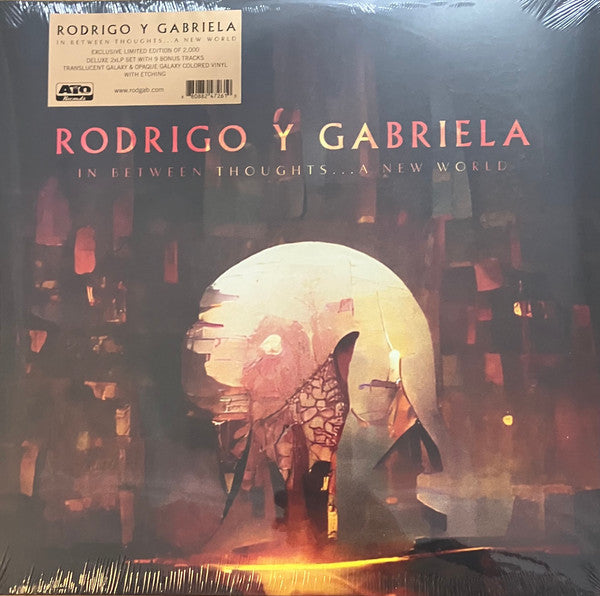 Album art for Rodrigo Y Gabriela - In Between Thoughts...A New World